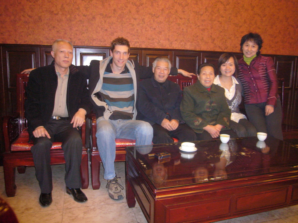 Tim, Miaomiao and Miaomiao`s uncle, aunt and grandparents in a restaurant in the city center