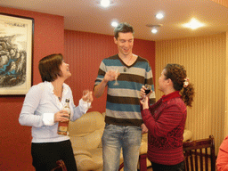 Tim, Miaomiao and a family member having drinks in a restaurant in the city center