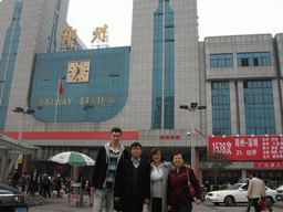 Tim, Miaomiao and Miaomiao`s parents in front of the Zhengzhou Railway Station