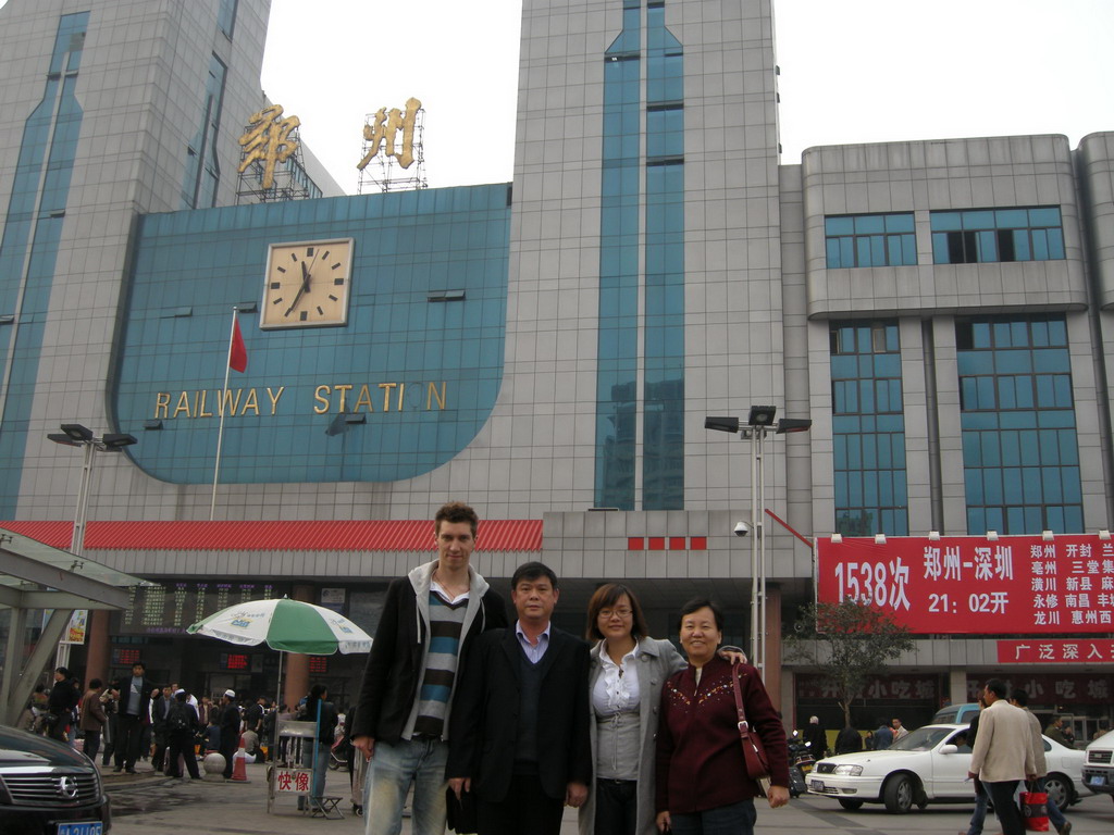 Tim, Miaomiao and Miaomiao`s parents in front of the Zhengzhou Railway Station