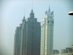 Tall buildings, viewed from a car