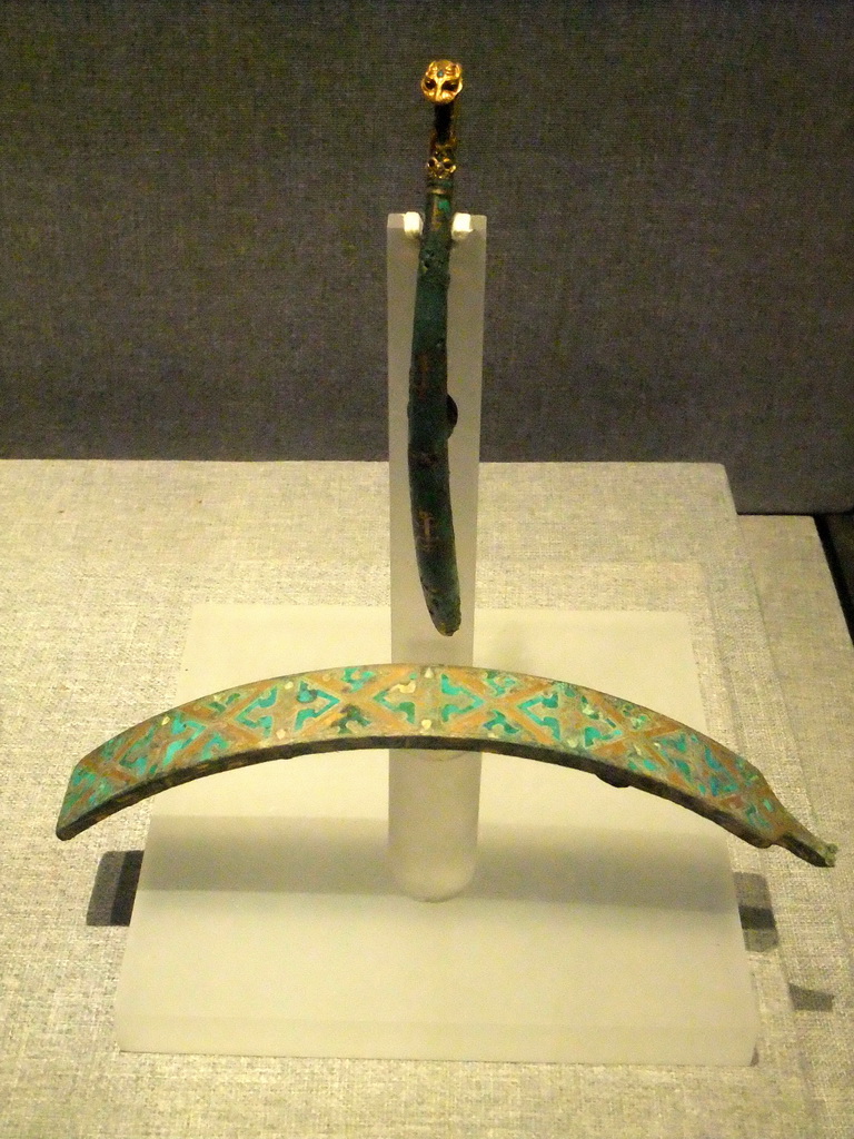 Bronze belt hooks inlaid with gold, silver and turquoise, at the Henan Provincial Museum