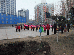 People dancing to celebrate the Chinese New Year at a square in the city center