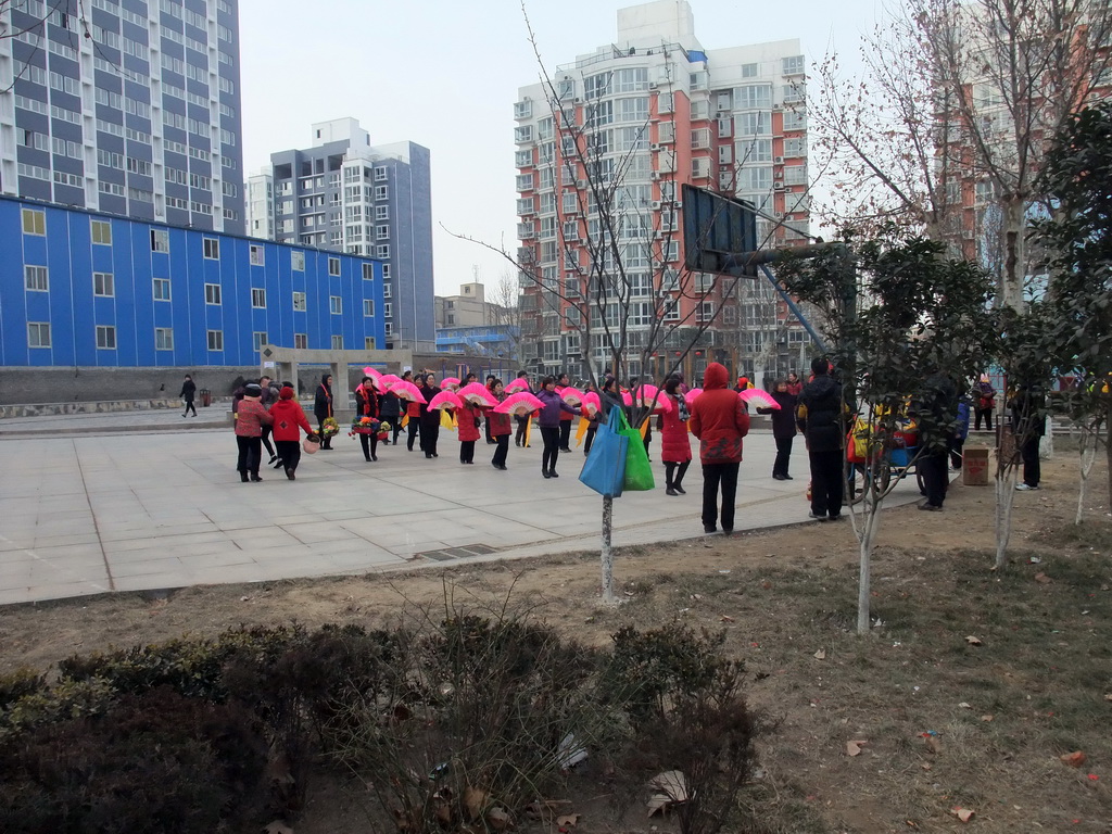 People dancing to celebrate the Chinese New Year at a square in the city center