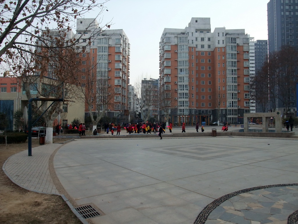 People dancing to celebrate the Chinese New Year at a square in the city center