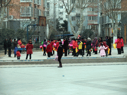 People dancing to celebrate the Chinese New Year at a square in the city center