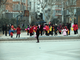 zhengzhou_2_097 - 343 kb - 1024x768 - People dancing to celebrate the Chinese New Year at a square in the city center People dancing to celebrate the Chinese New Year at a square in the city center