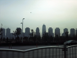 zhengzhou_2_099 - 155 kb - 1024x768 - The Greenland Square building and other buildings at the Zhengdong New Area, viewed from a car The Greenland Square building and other buildings at the Zhengdong New Area, viewed from a car