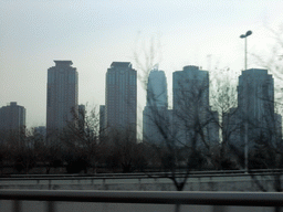 The Greenland Square building and other buildings at the Zhengdong New Area, viewed from a car