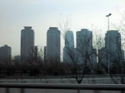 zhengzhou_2_100 - 170 kb - 1024x768 - The Greenland Square building and other buildings at the Zhengdong New Area, viewed from a car The Greenland Square building and other buildings at the Zhengdong New Area, viewed from a car