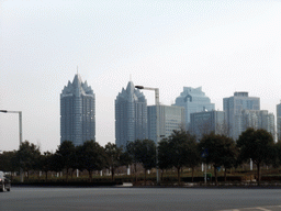 The Novotel buildings and other buildings at the Zhengdong New Area, viewed from a car