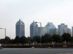 zhengzhou_2_101 - 144 kb - 1024x768 - The Novotel buildings and other buildings at the Zhengdong New Area, viewed from a car The Novotel buildings and other buildings at the Zhengdong New Area, viewed from a car