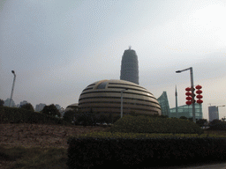 The Henan Art Center and the Greenland Square building at the Zhengdong New Area, viewed from a car