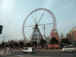 The Zhengzhou Ferris Wheel at Century Amusement Park, viewed from a car