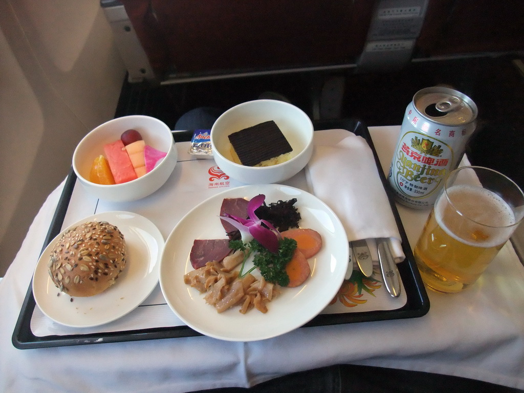 Lunch in the first class seat in the airplane to Haikou