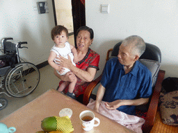 Max with Miaomiao`s grandparents at their home at the Nanyangxincun Residential District
