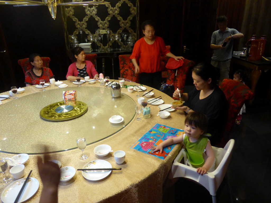 Miaomiao, Max and Miaomiao`s family at the Beijing Dayali restaurant