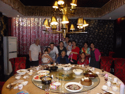 Tim, Miaomiao, Max and Miaomiao`s family at the Beijing Dayali restaurant