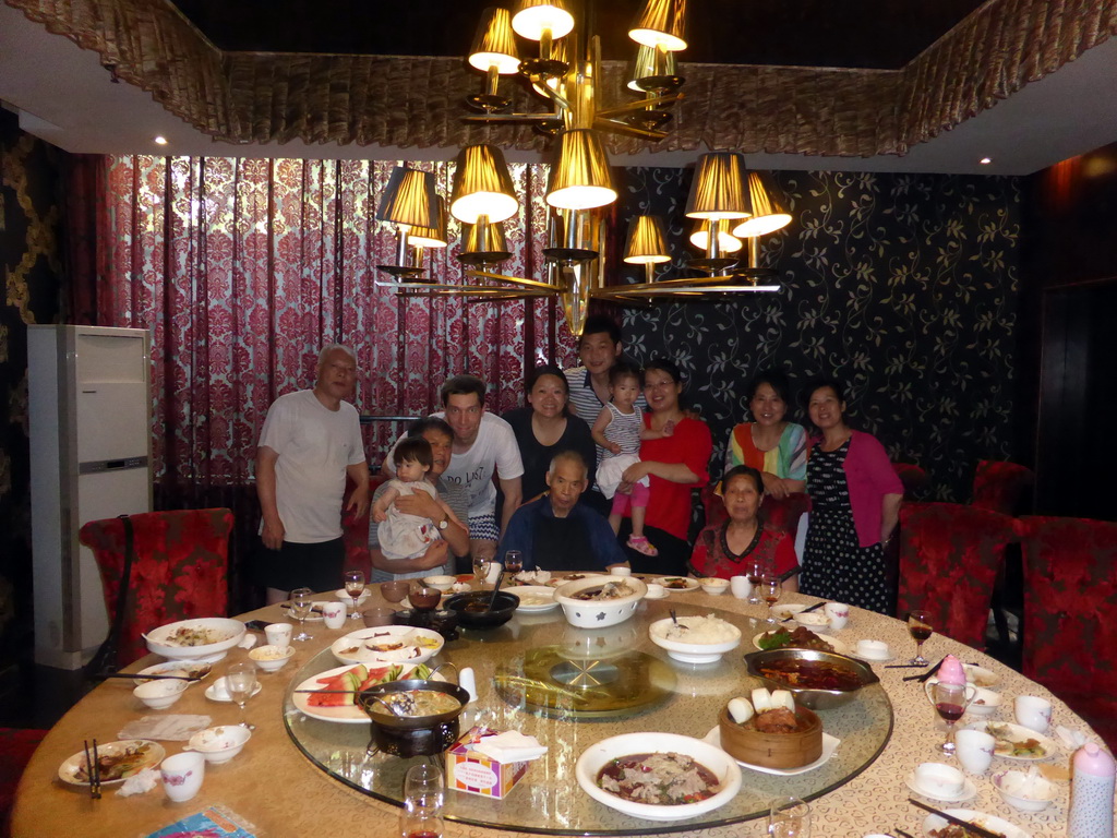 Tim, Miaomiao, Max and Miaomiao`s family at the Beijing Dayali restaurant