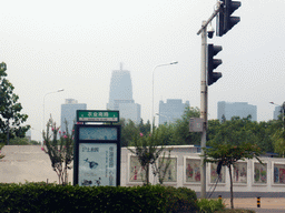 The Greenland Plaza tower and the Zhengzhou International Convention Center, viewed from the car on the Nong Ye South Road