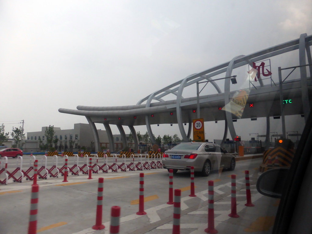 Exit from the toll road at the G4 highway, viewed from the car