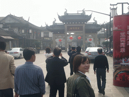 Miaomiao in front of the main entrance gate to the Zhouzhuang Water Town at Quanfu Road