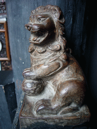 Statuette of a Lion with a ball in a house at the Zhouzhuang Water Town