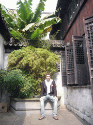 Tim in the garden of a house at the Zhouzhuang Water Town