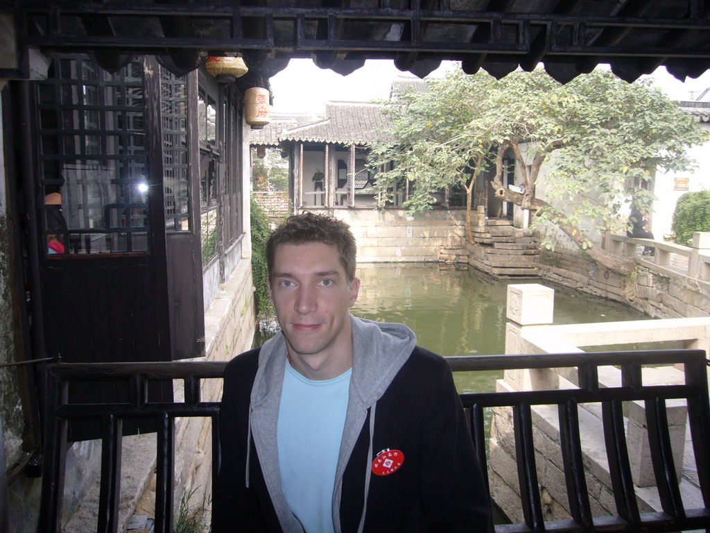 Tim in front of a canal at the Zhouzhuang Water Town