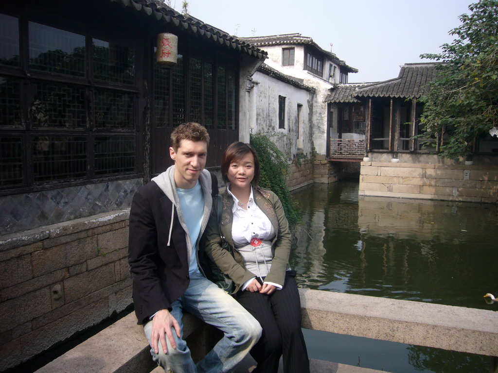 Tim and Miaomiao in front of a canal at the Zhouzhuang Water Town