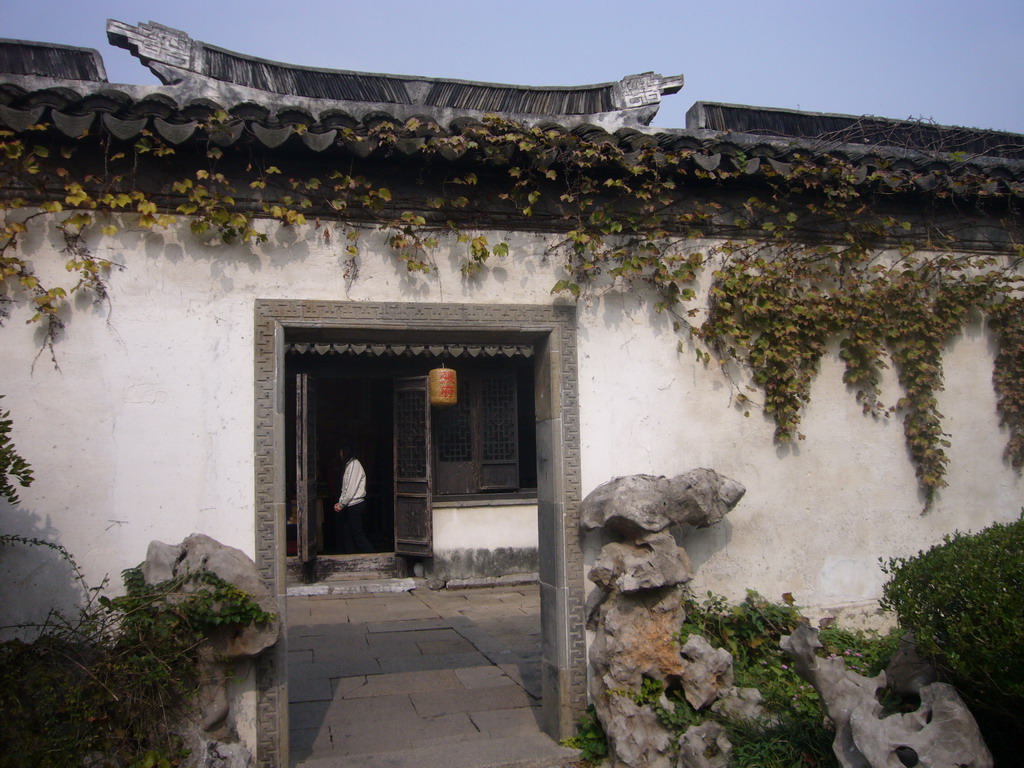 Gate in the garden of a house at the Zhouzhuang Water Town