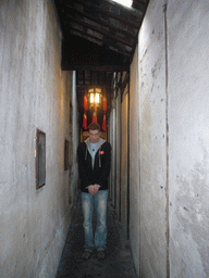 Tim at a narrow alley with lanterns at the Zhouzhuang Water Town