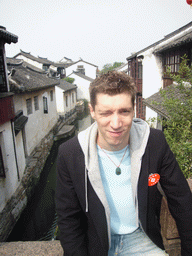 Tim in front of a canal at the Zhouzhuang Water Town