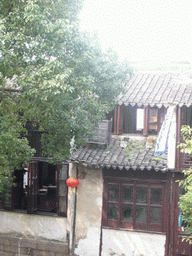 Facade of a house at the Zhouzhuang Water Town, viewed from the first floor of a restaurant