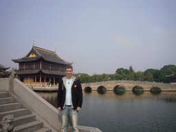 Tim in front of bridges and pavilions of the Chengxu Temple at the Zhouzhuang Water Town