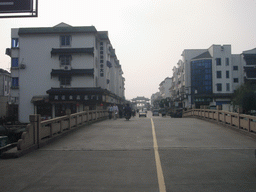 Bridge at Quanfu Road with the front of the main entrance gate to the Zhouzhuang Water Town