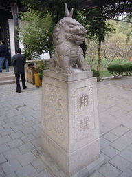 Statue in front of a temple, on the way back to Shanghai