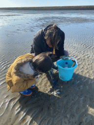 Miaomiao and Max looking for shellfish at the Stille Strand beach