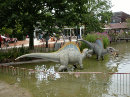 Spinosaur statues in a pond at Dinoland Zwolle
