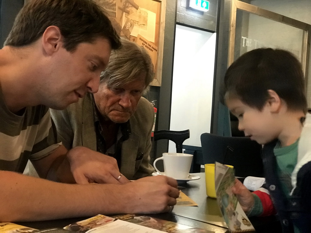 Tim, Max and his grandfather making puzzles at the T-Rextaurant at Dinoland Zwolle